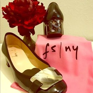 Gorgeous 2 inch stacked heel. Black patent leather